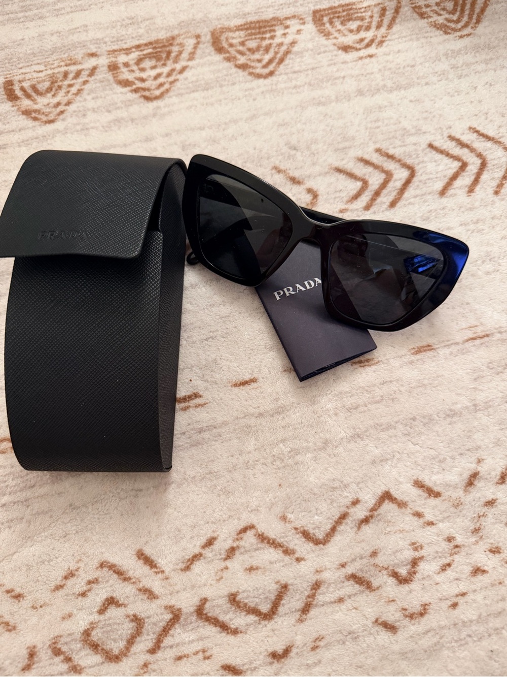 Prada Black Cat-Eye Sunglasses with Dark Lenses